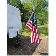 Load image into Gallery viewer, A single camper flag holder securely bolted to an RV hitch coupling, demonstrating a rock-solid mounting solution.
