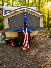 Load image into Gallery viewer, Journeyman hybrid trailer flag mount installed on camper front hitch coupling with American flag

